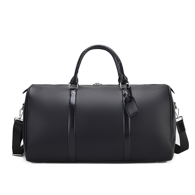 THE MICA LEATHER DUFFLE BAG - MANSLANE