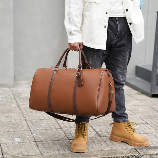 THE MICA LEATHER DUFFLE BAG - MANSLANE